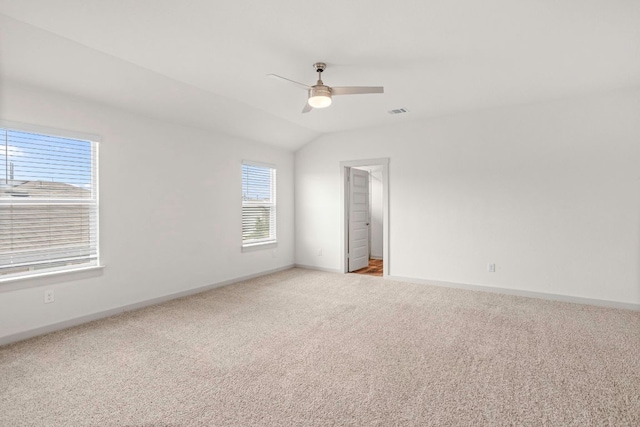 117 Scarborough Way, San Marcos, TX 78666 - carpeted empty room featuring baseboards, a ceiling fan, and vaulted ceiling