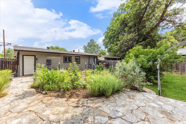 3409 Kay St, Austin, TX 78702 - rear view of house featuring a patio area
