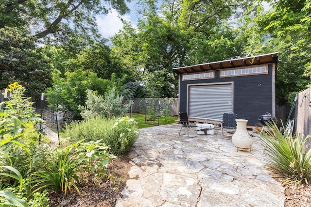 3409 Kay St, Austin, TX 78702 - fenced backyard with a patio area and an outdoor structure