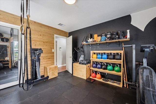 3409 Kay St, Austin, TX 78702 - workout area with wood walls