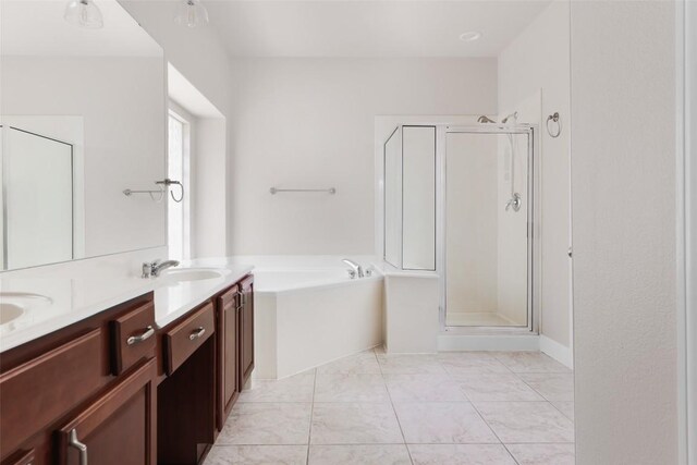7921 Davis Mountain Pass, Austin, TX 78726 - full bath with a bath, a stall shower, double vanity, and marble look tiles