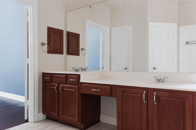 7921 Davis Mountain Pass, Austin, TX 78726 - bathroom featuring double vanity and tile patterned floors