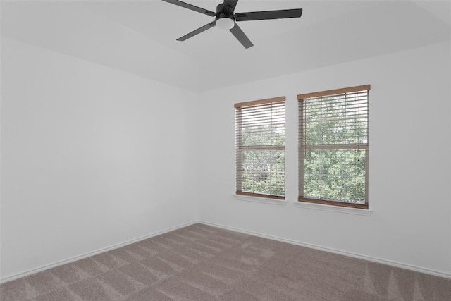 7921 Davis Mountain Pass, Austin, TX 78726 - carpeted spare room featuring a ceiling fan, vaulted ceiling, and baseboards