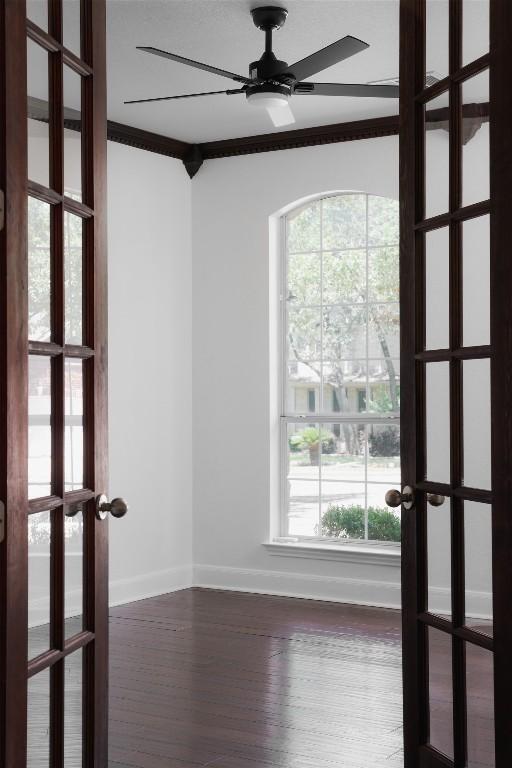 7921 Davis Mountain Pass, Austin, TX 78726 - unfurnished room with french doors, a ceiling fan, plenty of natural light, wood finished floors, and crown molding