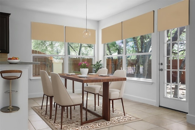 7921 Davis Mountain Pass, Austin, TX 78726 - dining area with light tile patterned flooring and baseboards