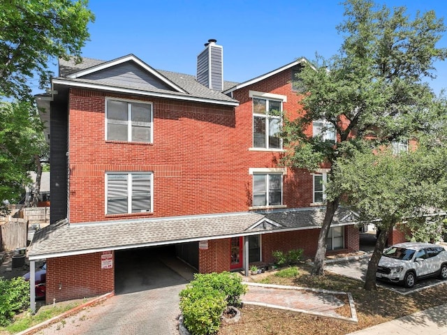 2804 Rio Grande St Unit 206, Austin, TX 78705 - townhome / multi-family property with brick siding and a chimney