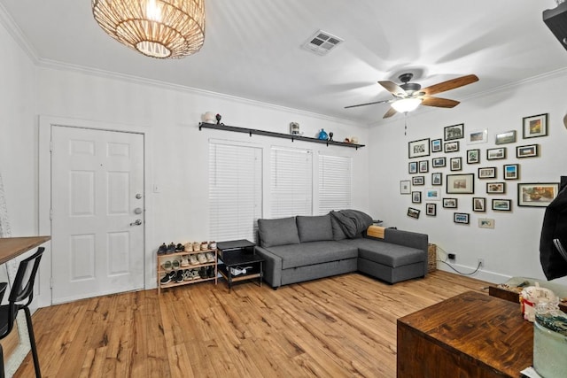 2804 Rio Grande St Unit 206, Austin, TX 78705 - living room featuring a ceiling fan, light wood finished floors, and crown molding