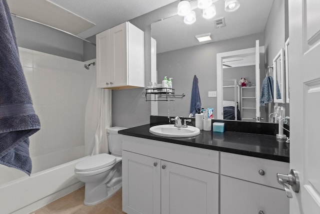 2804 Rio Grande St Unit 206, Austin, TX 78705 - full bathroom featuring shower / tub combo with curtain, vanity, toilet, and tile patterned floors