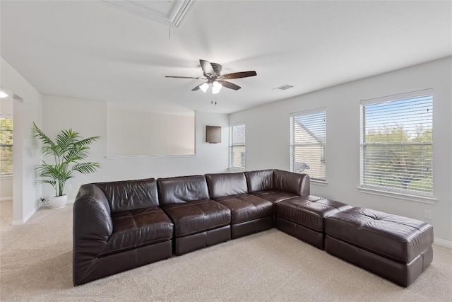 11237 Lost Maples Trl, Austin, TX 78748 - living area featuring light carpet, attic access, ceiling fan, and baseboards