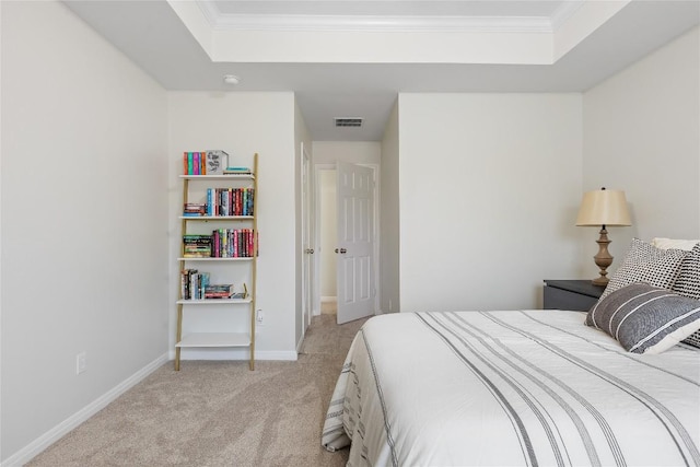 11237 Lost Maples Trl, Austin, TX 78748 - bedroom featuring a raised ceiling, light colored carpet, crown molding, and baseboards
