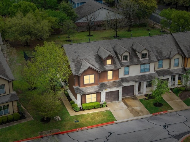 11237 Lost Maples Trl, Austin, TX 78748 - view of front of home with concrete driveway, an attached garage, and brick siding