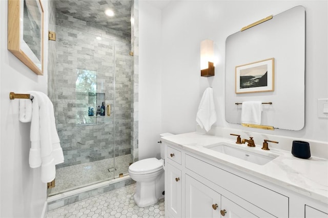 4901 Southcrest Dr, Austin, TX 78746 - bathroom featuring toilet, vanity, a shower stall, and tile patterned floors
