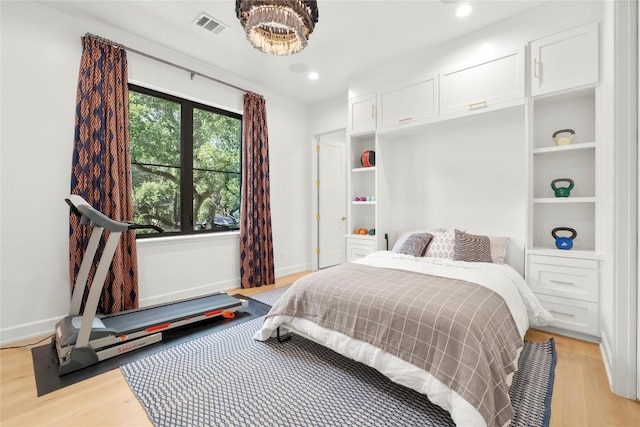 4901 Southcrest Dr, Austin, TX 78746 - bedroom with light wood finished floors and baseboards