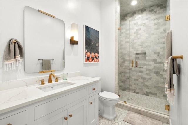 4901 Southcrest Dr, Austin, TX 78746 - bathroom featuring vanity, a shower stall, toilet, tile patterned flooring, and recessed lighting