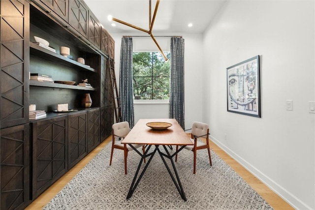 4901 Southcrest Dr, Austin, TX 78746 - dining space with light wood finished floors, baseboards, and recessed lighting