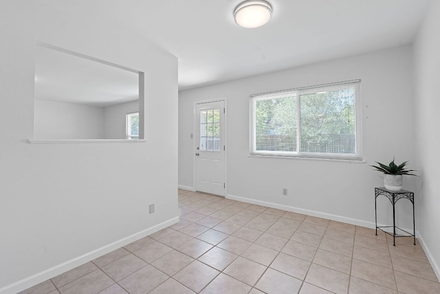2804 Bushnell Dr, Austin, TX 78745 - unfurnished room featuring baseboards and light tile patterned floors