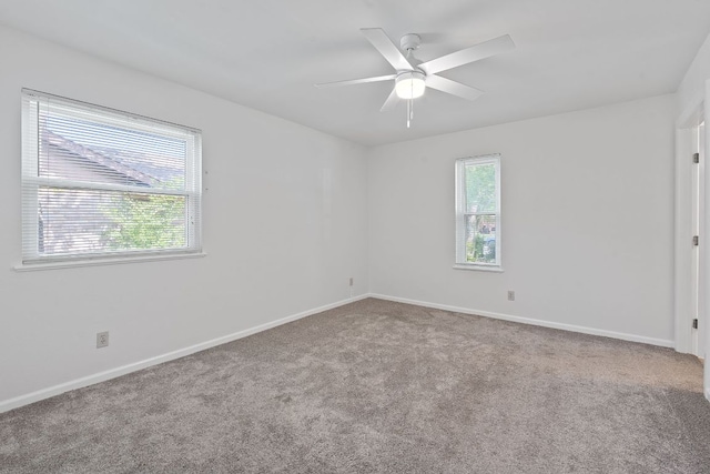 2804 Bushnell Dr, Austin, TX 78745 - carpeted empty room featuring a ceiling fan and baseboards