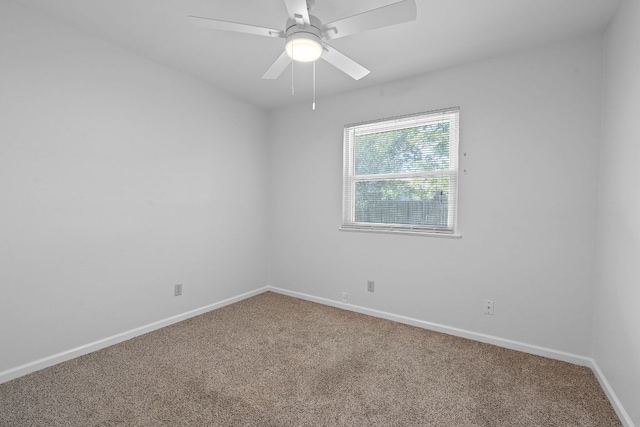 2804 Bushnell Dr, Austin, TX 78745 - carpeted spare room featuring baseboards and ceiling fan