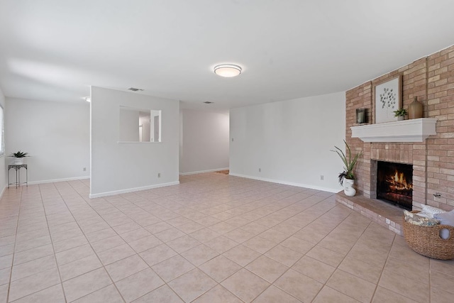 2804 Bushnell Dr, Austin, TX 78745 - unfurnished living room featuring a fireplace and light tile patterned flooring