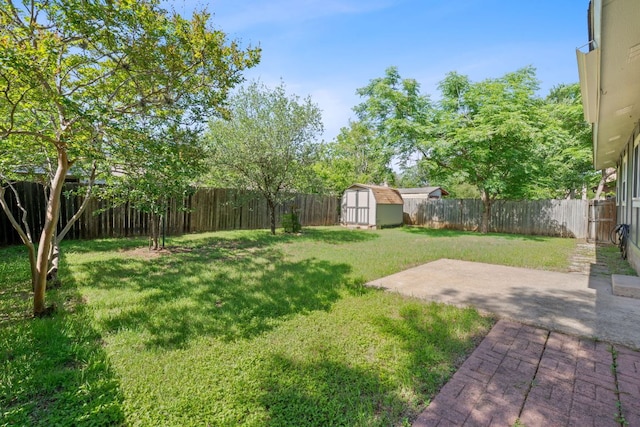 2804 Bushnell Dr, Austin, TX 78745 - fenced backyard featuring a storage unit and a patio area