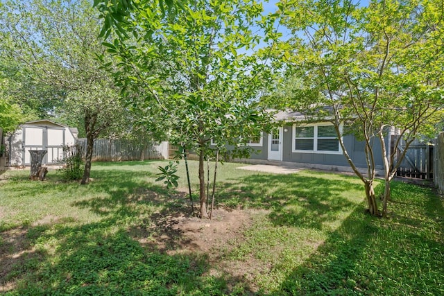 2804 Bushnell Dr, Austin, TX 78745 - fenced backyard with a storage unit