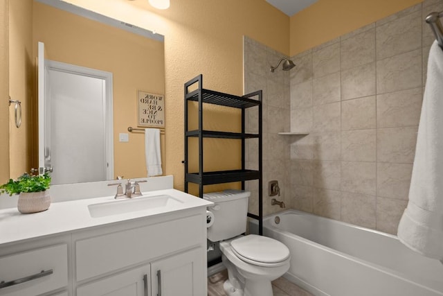 136 Medina Hills Ct, Austin, TX 78737 - full bathroom with toilet, vanity, shower / bath combination, and a textured wall