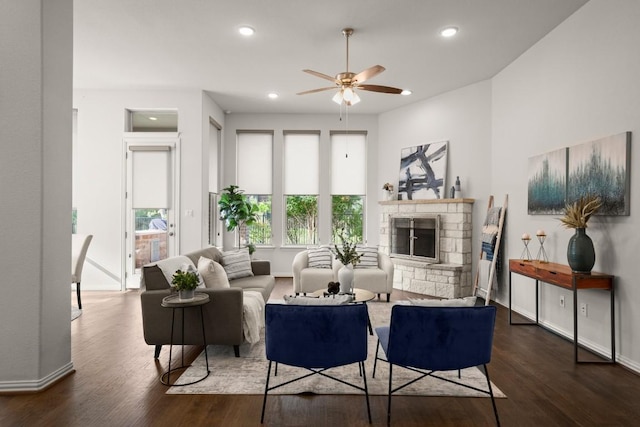 136 Medina Hills Ct, Austin, TX 78737 - living area with ceiling fan, dark wood-style floors, baseboards, recessed lighting, and a fireplace