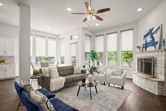 136 Medina Hills Ct, Austin, TX 78737 - living area with a ceiling fan, recessed lighting, dark wood-style floors, and a stone fireplace