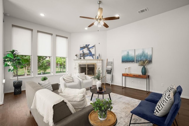 136 Medina Hills Ct, Austin, TX 78737 - living room with ceiling fan, recessed lighting, wood finished floors, baseboards, and a fireplace