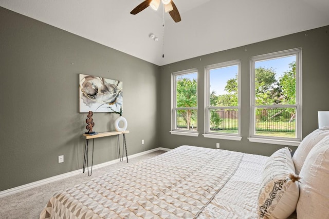 136 Medina Hills Ct, Austin, TX 78737 - bedroom featuring carpet flooring, baseboards, vaulted ceiling, and ceiling fan