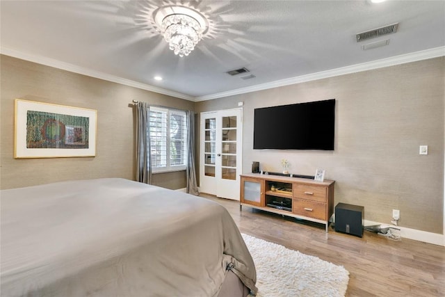 2602 Rollingwood Dr, Rollingwood, TX 78746 - bedroom with ornamental molding, light wood-type flooring, baseboards, recessed lighting, and a chandelier