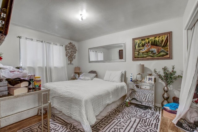 8505 Dryfield Dr, Austin, TX 78758 - bedroom featuring wood finished floors