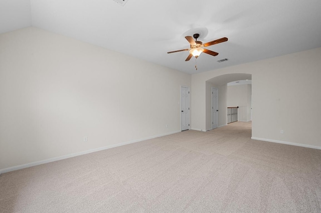 12304 Buvana Dr, Austin, TX 78739 - unfurnished room with arched walkways, a ceiling fan, light colored carpet, and baseboards