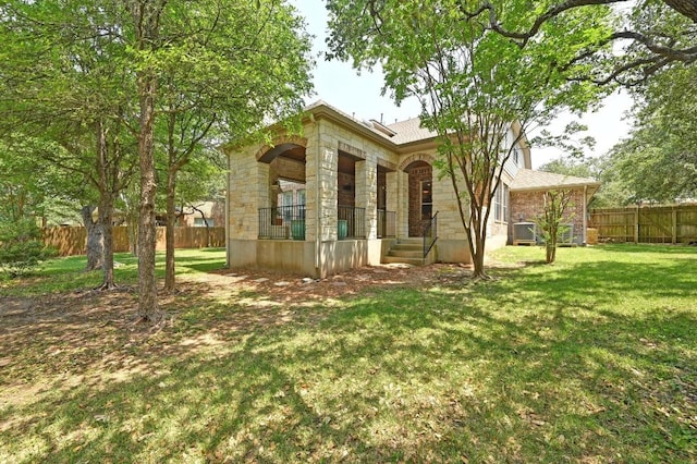 12304 Buvana Dr, Austin, TX 78739 - back of property featuring stone siding and a porch