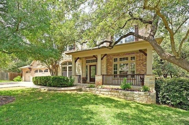 12304 Buvana Dr, Austin, TX 78739 - view of front of house with a porch, brick siding, an attached garage, and concrete driveway