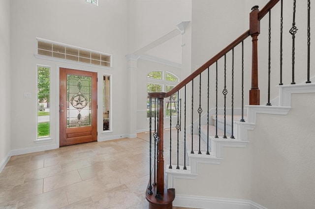 12304 Buvana Dr, Austin, TX 78739 - foyer entrance featuring a high ceiling, baseboards, and stairway