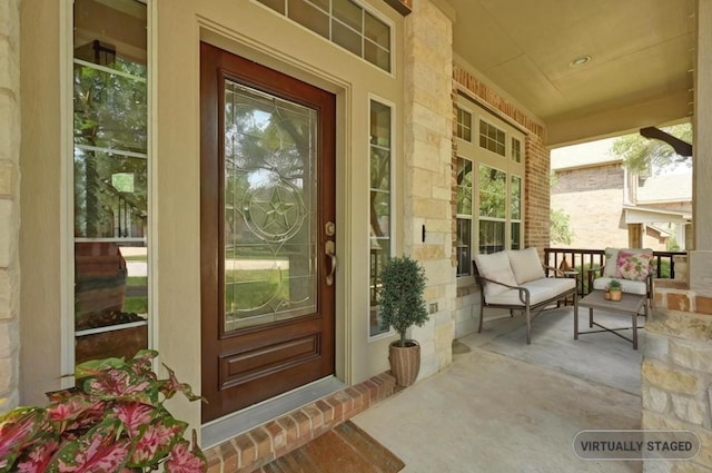 12304 Buvana Dr, Austin, TX 78739 - view of exterior entry featuring covered porch and stone siding