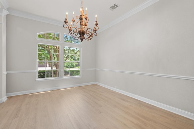 12304 Buvana Dr, Austin, TX 78739 - spare room featuring a chandelier, light wood-style flooring, crown molding, and baseboards
