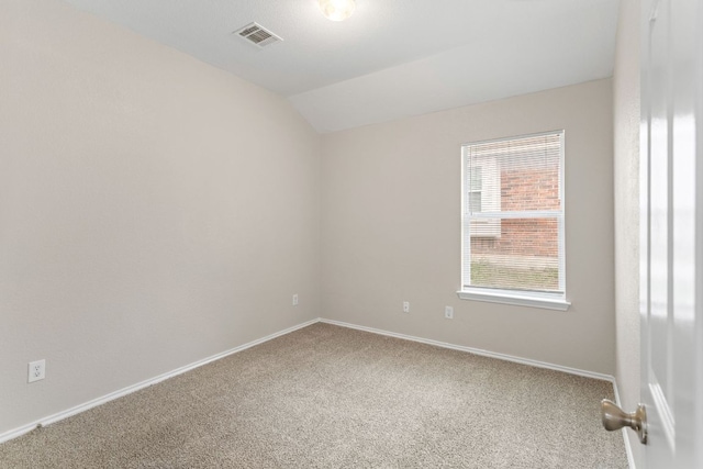 117 N Maplewood, Kyle, TX 78640 - empty room with carpet floors and lofted ceiling