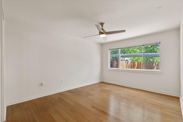 2200 Dickson Dr Unit 117, Austin, TX 78704 - empty room with light wood-style flooring, baseboards, and a ceiling fan