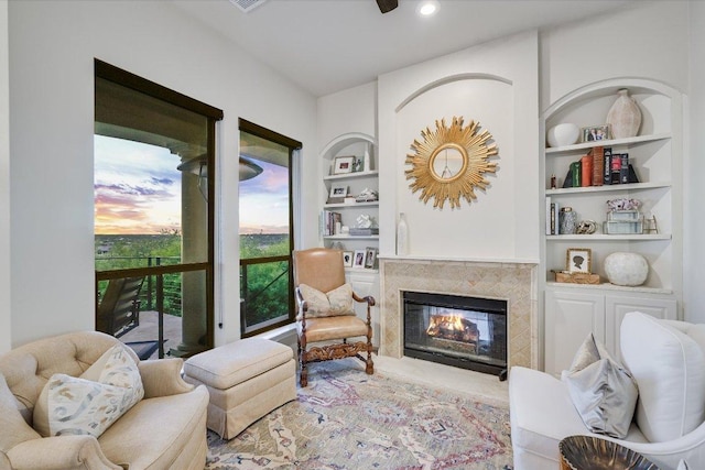921 Electra, Lakeway, TX 78734 - living room with a tiled fireplace and built in shelves
