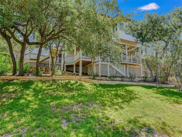 921 Electra, Lakeway, TX 78734 - back of house with stairs and a yard