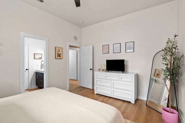 215 Crystal Knoll Blvd, Georgetown, TX 78626 - bedroom with light wood-style flooring, baseboards, and a ceiling fan