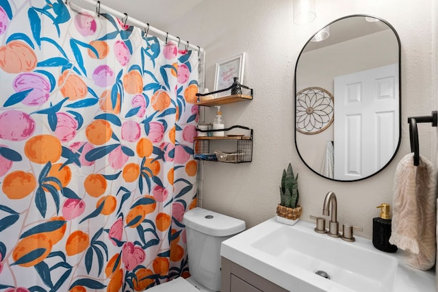 215 Crystal Knoll Blvd, Georgetown, TX 78626 - full bath featuring a textured wall, vanity, toilet, and a shower with curtain