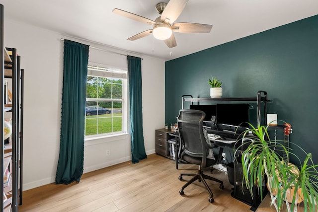 215 Crystal Knoll Blvd, Georgetown, TX 78626 - office area with a ceiling fan, wood finished floors, and baseboards