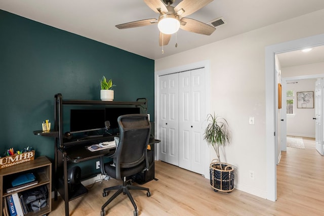 215 Crystal Knoll Blvd, Georgetown, TX 78626 - office area with wood finished floors, a ceiling fan, and baseboards
