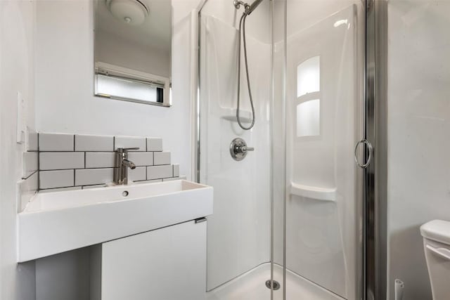 1506 Northridge Dr, Austin, TX 78723 - full bath featuring backsplash, a stall shower, toilet, and vanity