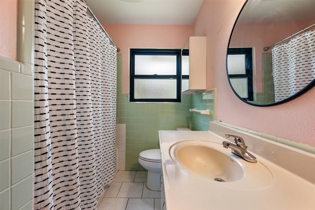 1506 Northridge Dr, Austin, TX 78723 - bathroom with tile patterned floors, tile walls, toilet, a shower with curtain, and vanity