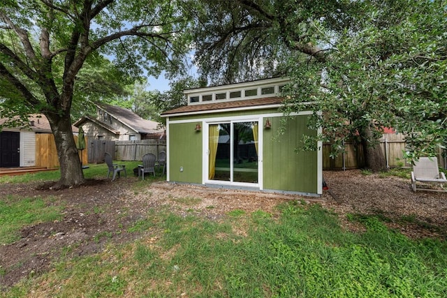 1506 Northridge Dr, Austin, TX 78723 - view of outdoor structure with a fenced backyard