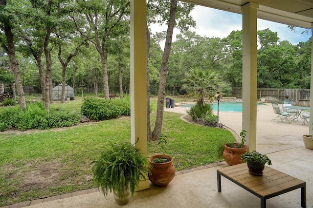 233 Maple Leaf Trl, Elgin, TX 78621 - view of patio / terrace with view of scattered trees
